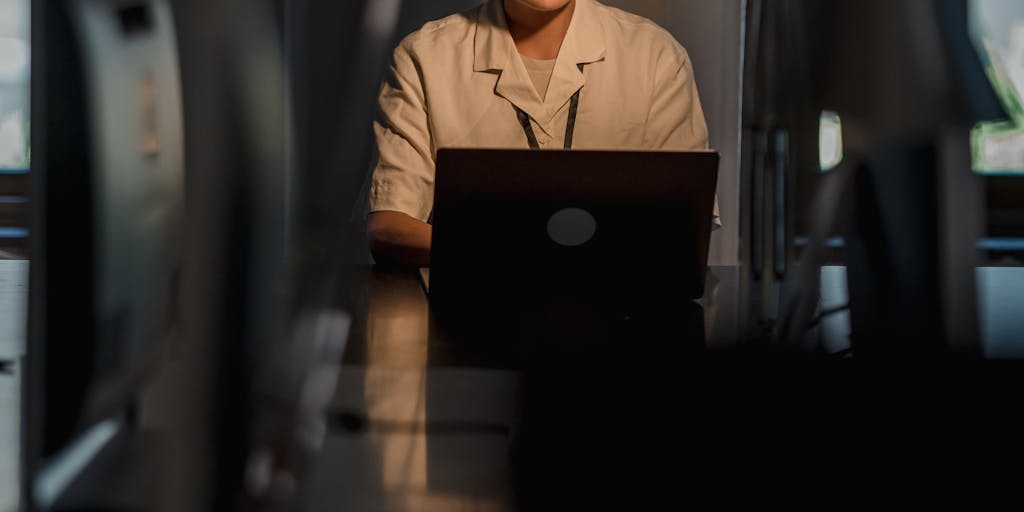 A split image showing a frustrated person on one side, surrounded by papers and clutter, and a relaxed person on the other side, using LeadFuze on a clean desk. This visual contrast highlights the efficiency and organization that LeadFuze brings to lead generation.