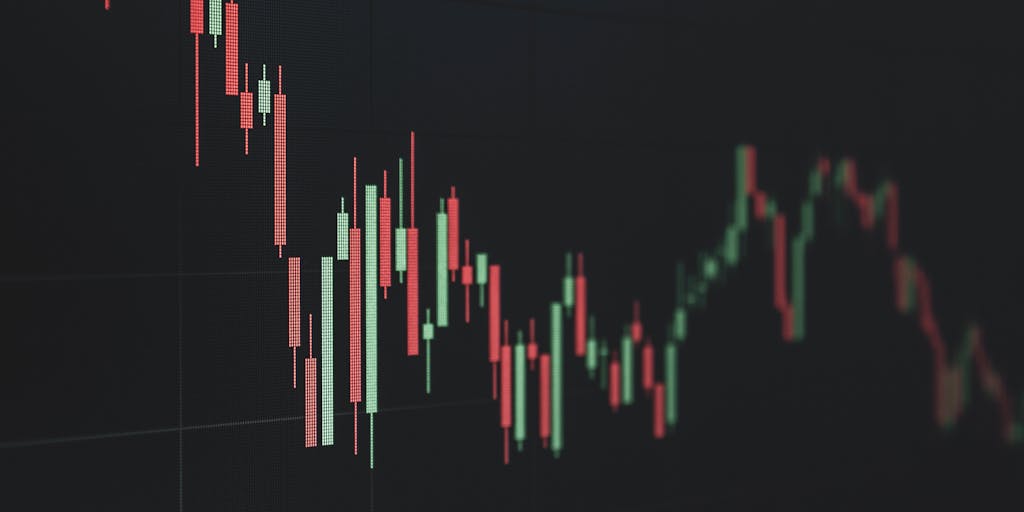 A conceptual image of a digital screen displaying fluctuating prices in real-time, with animated streaks of light moving across the screen to represent changes in pricing. The background is dark to make the screen pop.