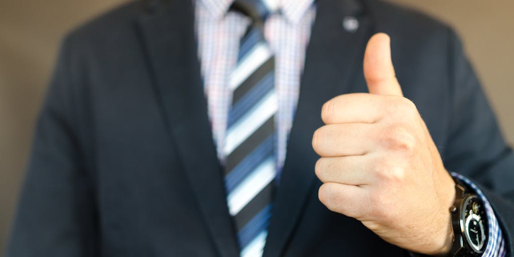 A creative split-screen image showing a person using LinkedIn Sales Navigator on one side and a successful sales presentation on the other. The left side features the digital interface with highlighted features, while the right side shows a confident presenter engaging an audience, illustrating the transition from research to real-world application.