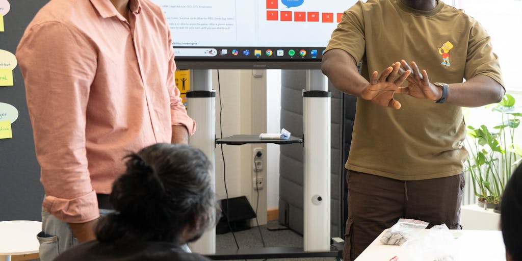 An engaging scene of a diverse group of people in a brainstorming session, surrounded by digital screens displaying various outreach metrics and social media feeds. The atmosphere is dynamic, with colorful post-it notes and charts on the walls, illustrating the collaborative nature of multichannel strategies.