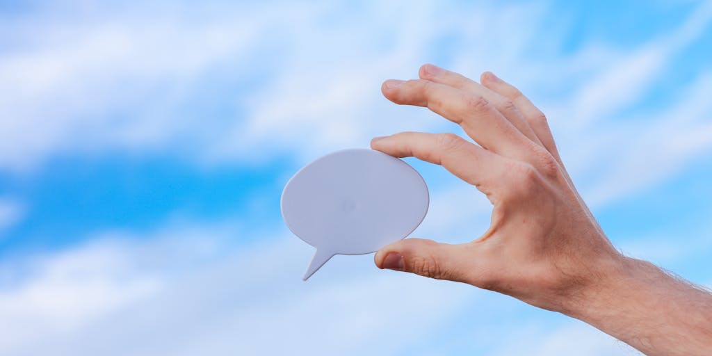 A creative illustration of a person standing at a crossroads, with one path leading to a traditional networking event and the other to a digital world filled with LinkedIn icons and InMail messages. This visual metaphor represents the choice between conventional networking and modern digital communication.